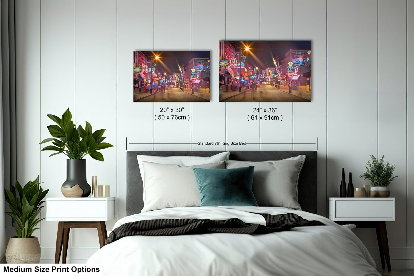 a bedroom with a bed and two pictures on the wall