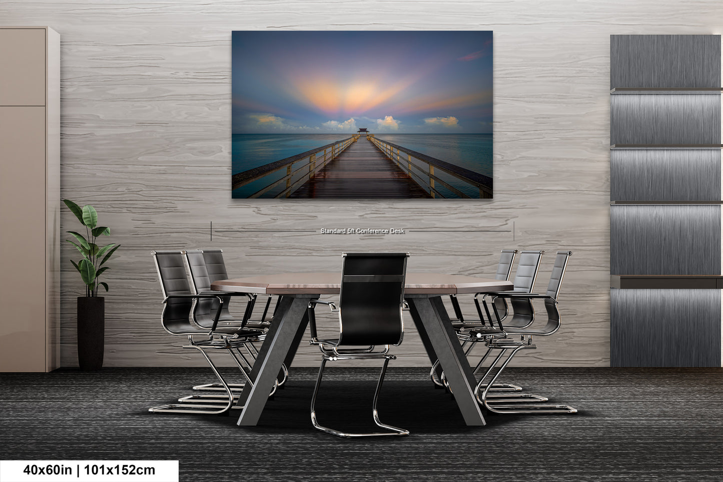 a dining room table with chairs and a painting on the wall