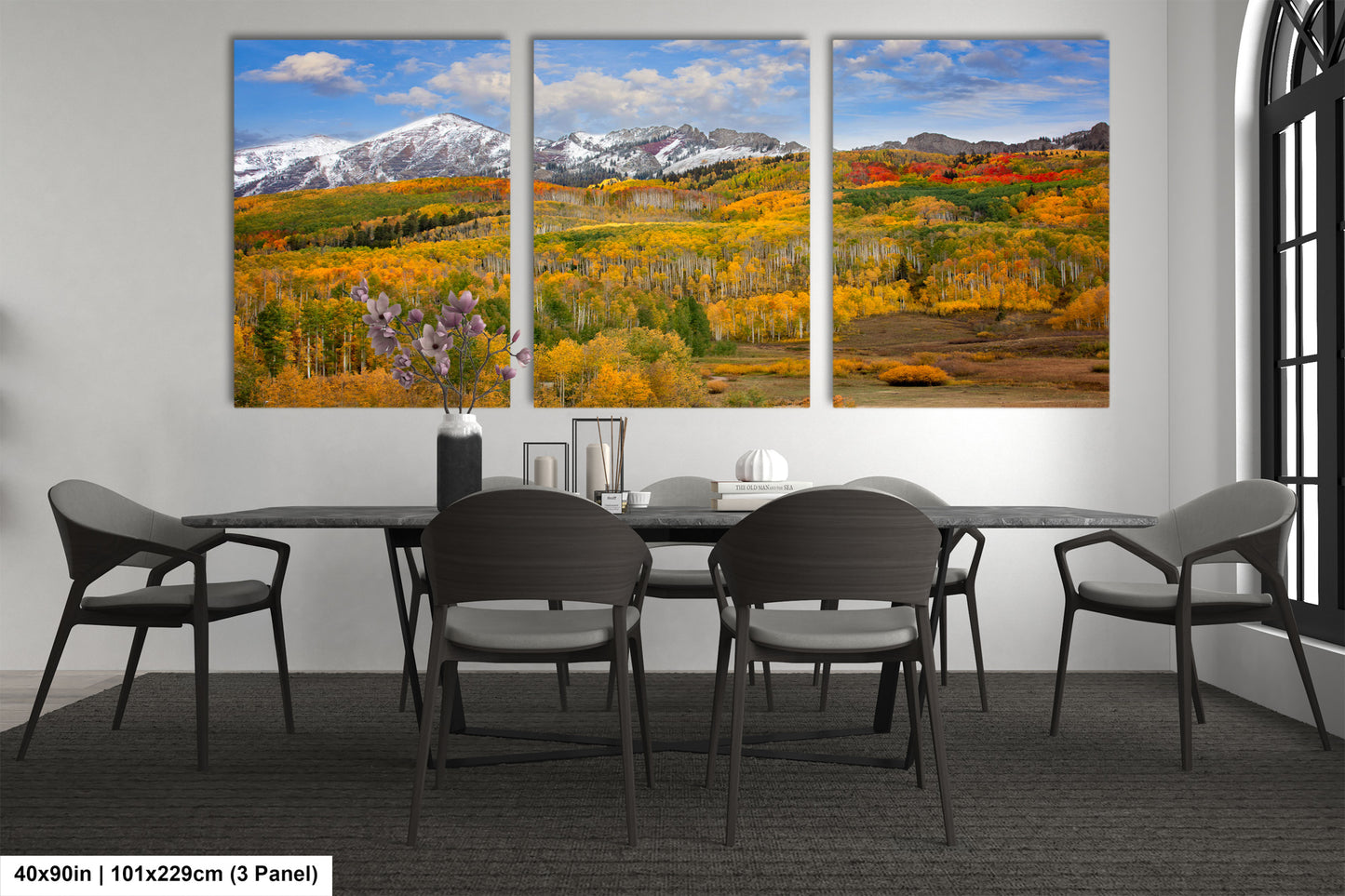 a dining room with a table and four chairs