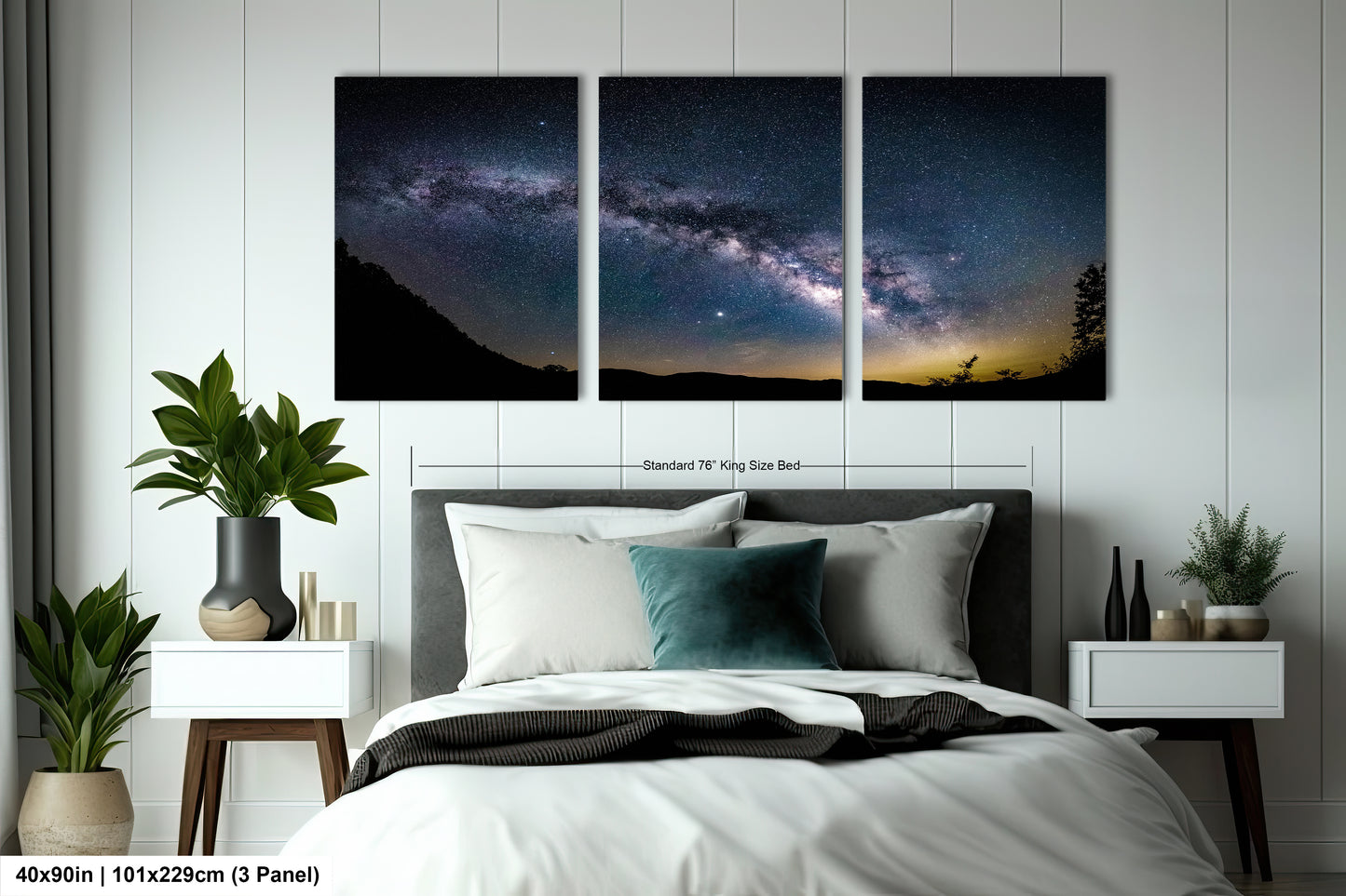 a bedroom with a bed and two paintings on the wall
