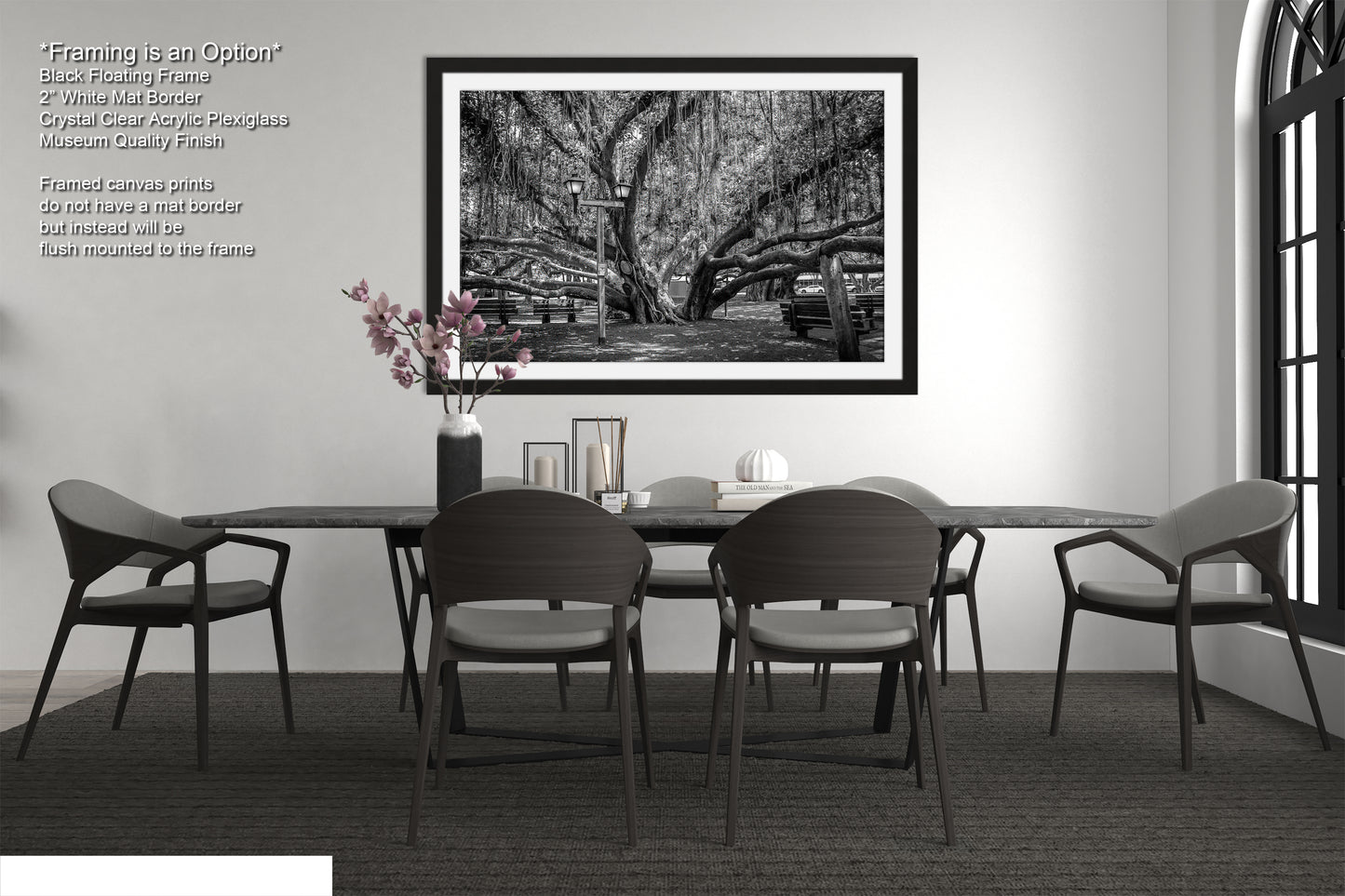 a black and white photo of a table and chairs