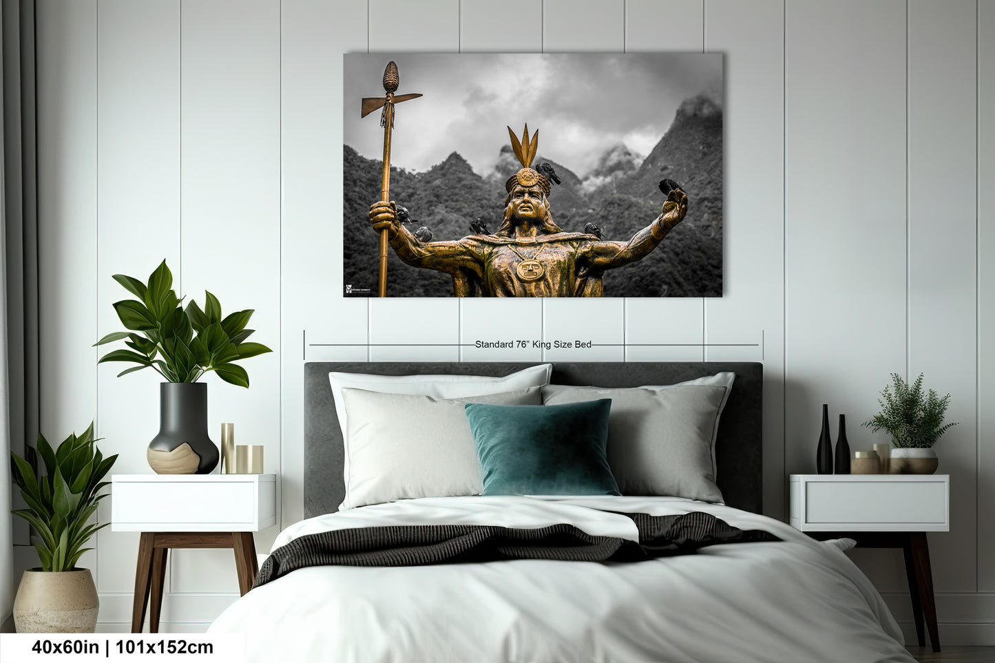 a bed room with a neatly made bed and a painting on the wall