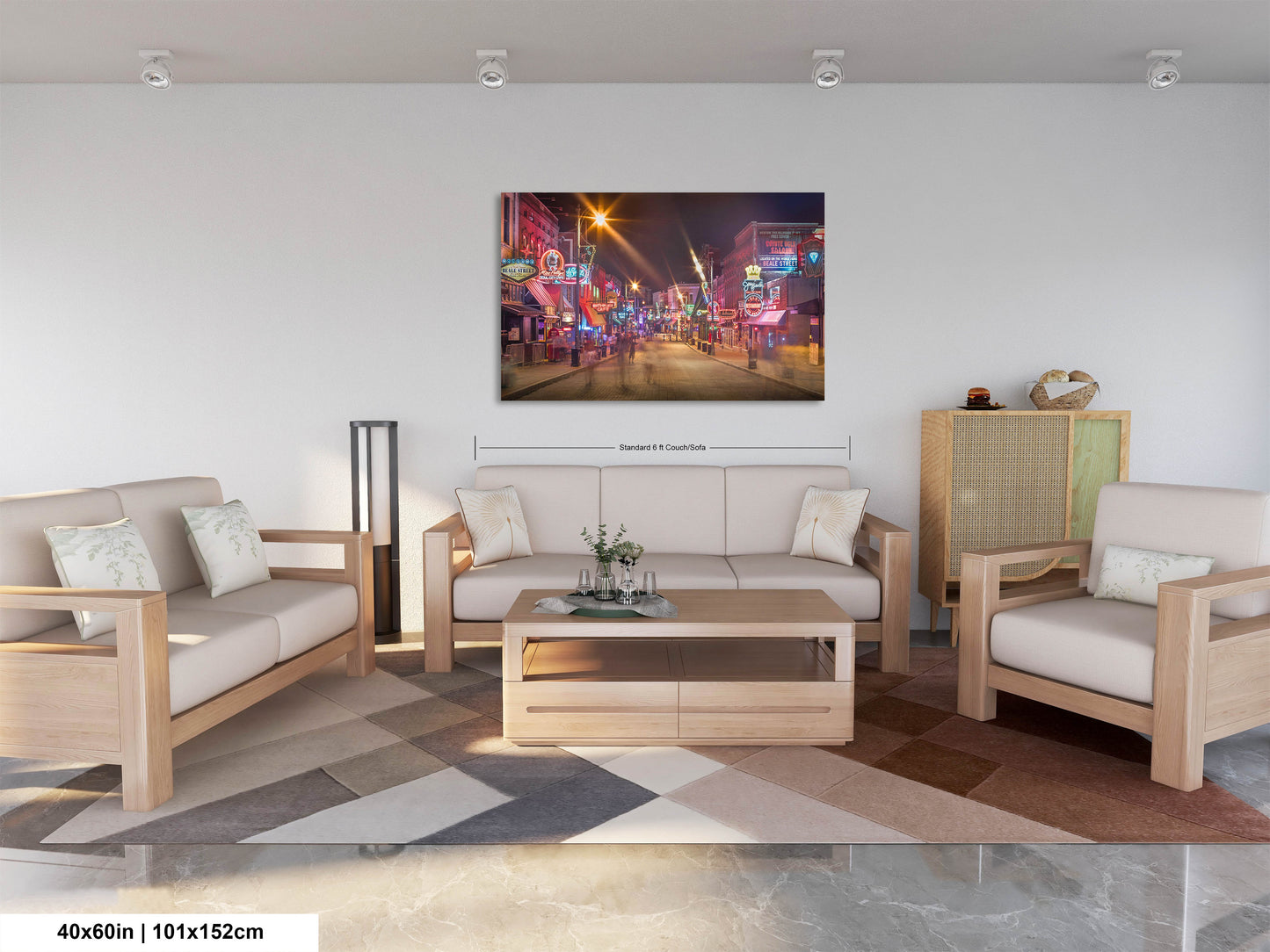 a living room filled with furniture and a painting on the wall