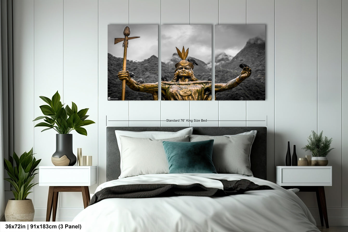 a bed room with a neatly made bed and paintings on the wall
