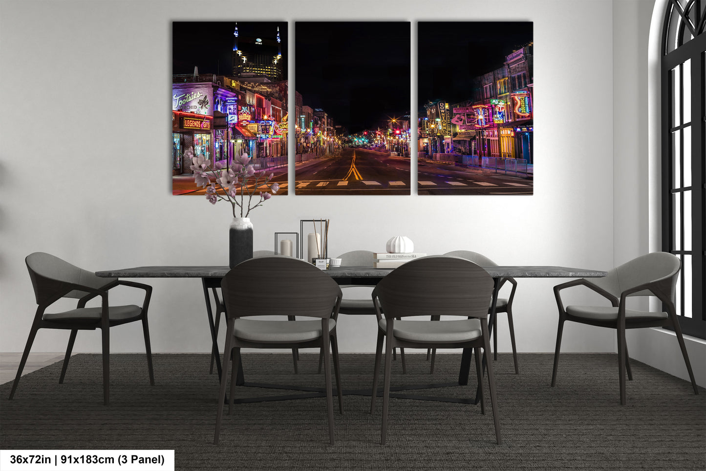 a dining room with a table and four chairs