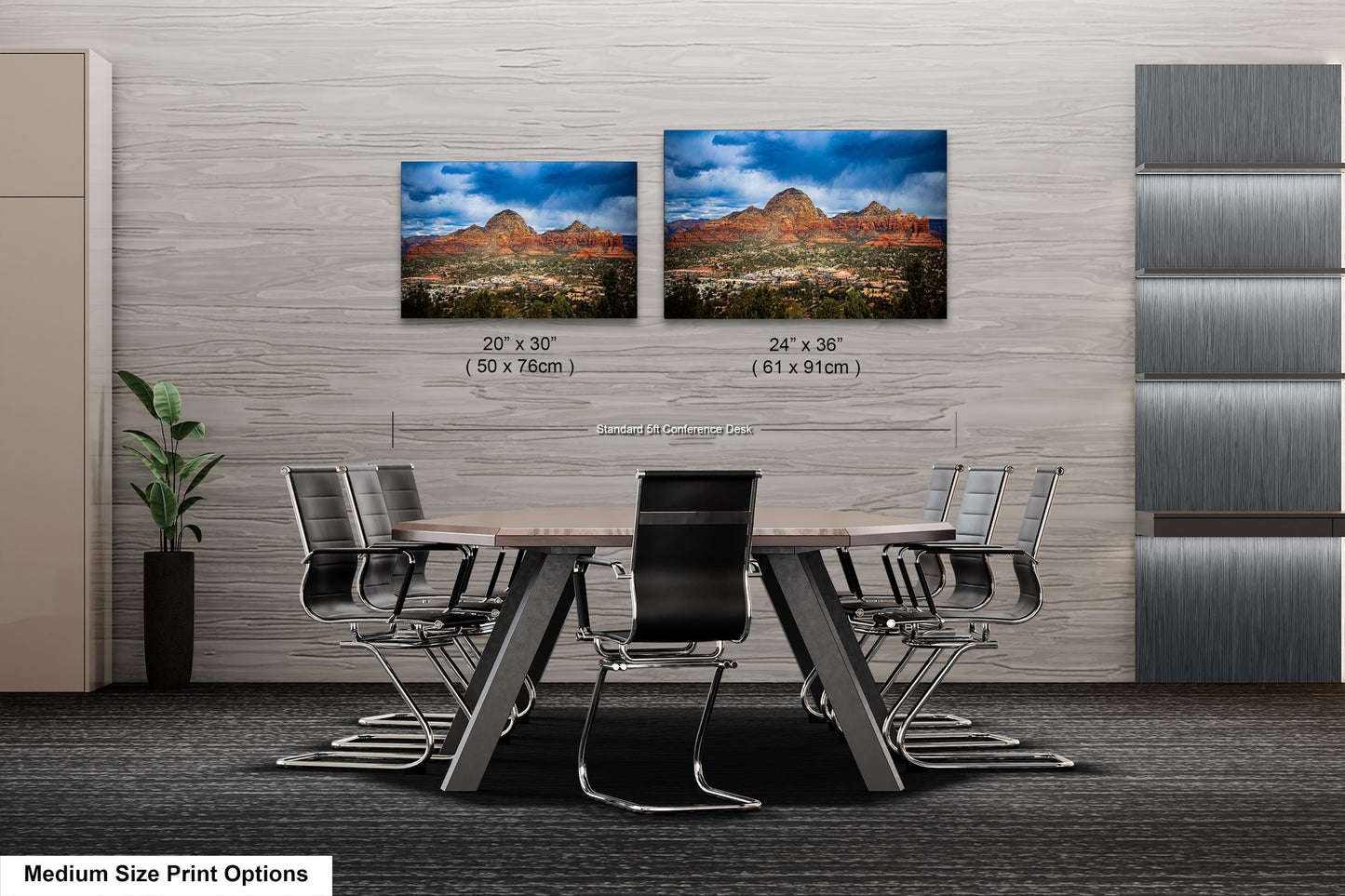 a dining room table with chairs and two pictures on the wall