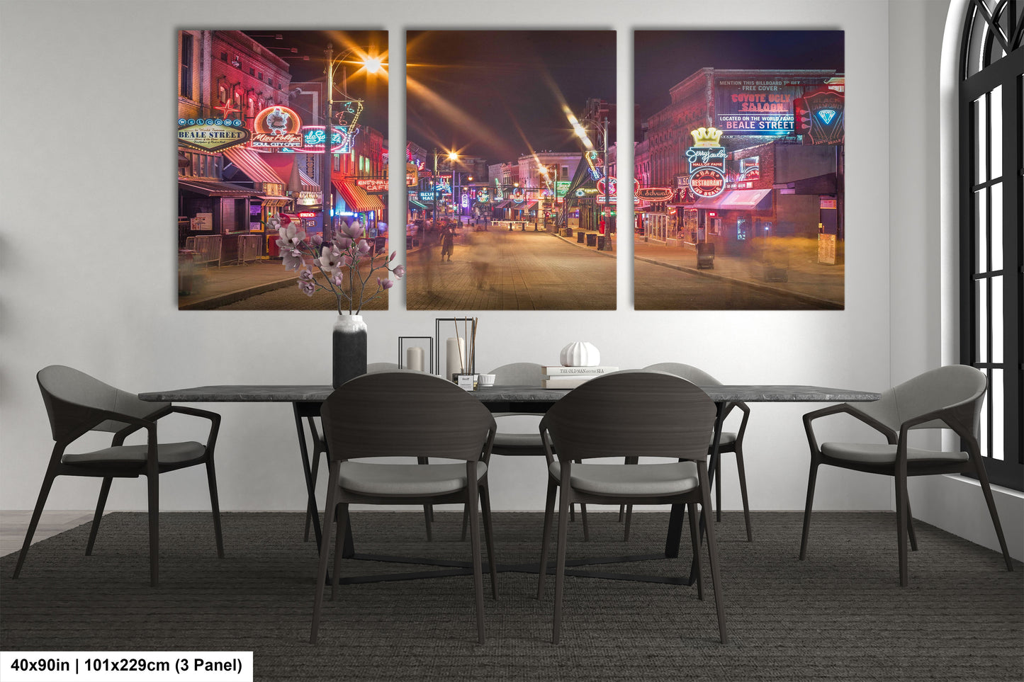 a dining room with a table and four chairs
