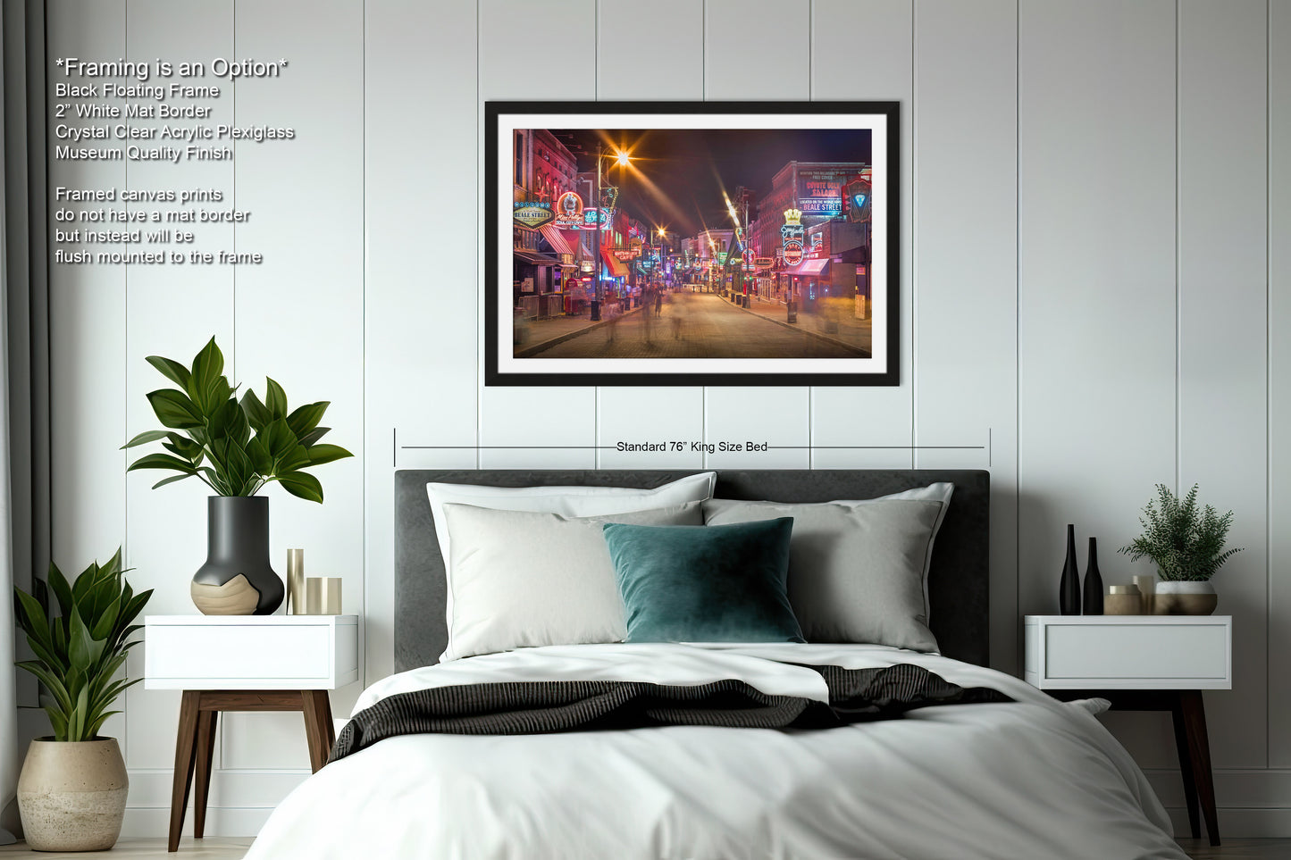 a bedroom with a bed and a picture hanging on the wall