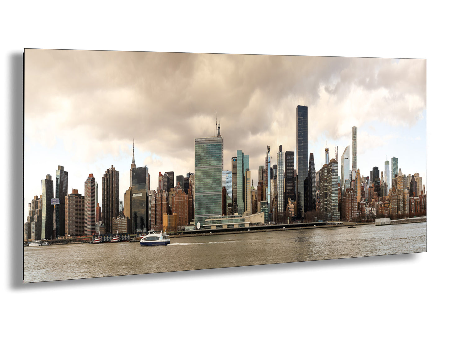 a picture of a city skyline with a boat in the water