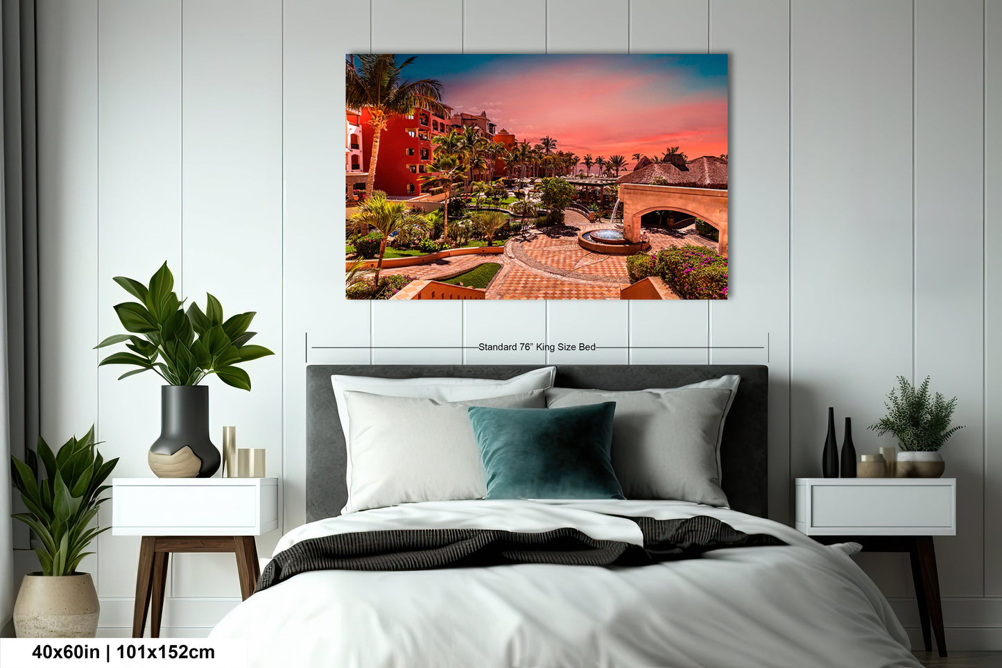 a bedroom with a bed and a painting on the wall