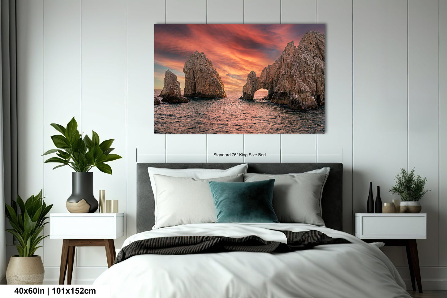 a bedroom with a bed and a painting on the wall