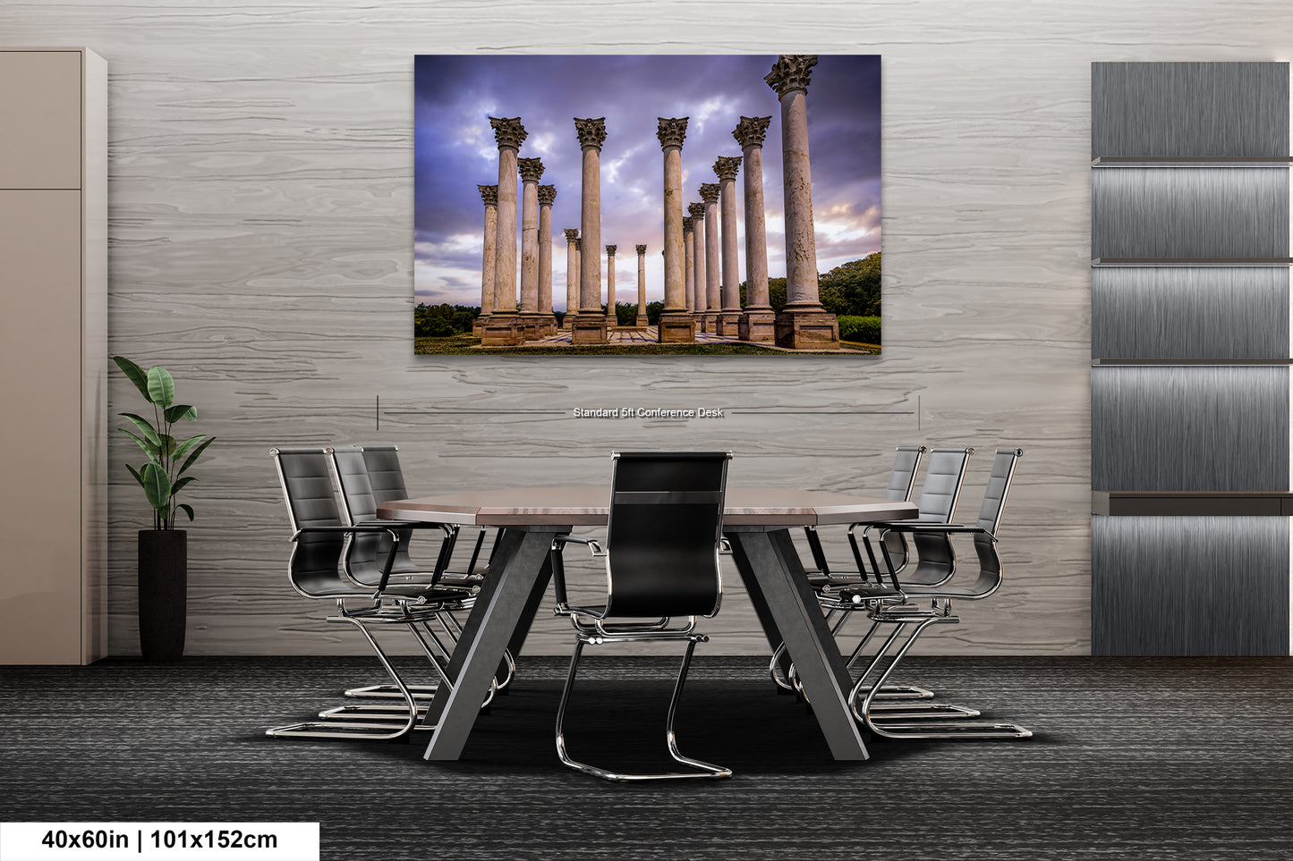 a room with a table and chairs and a painting on the wall