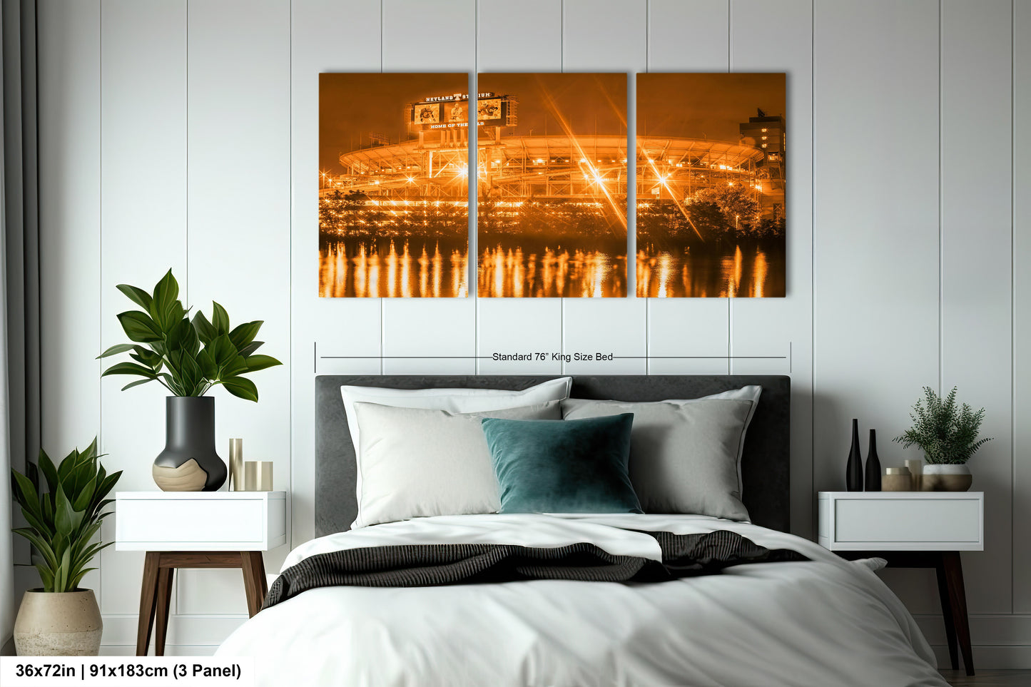 a bedroom with a large bed and a painting on the wall