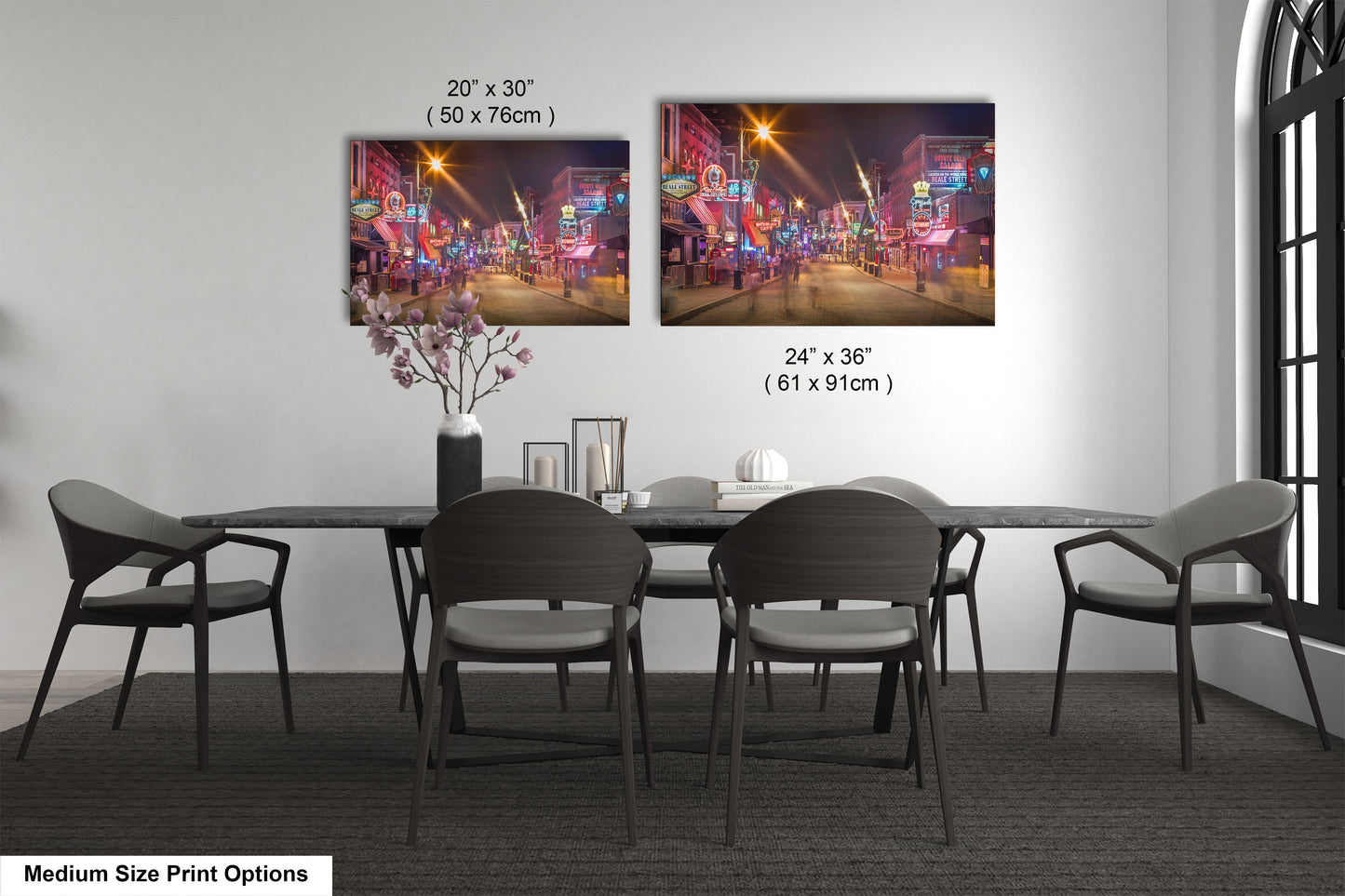 a dining room table with chairs and a vase of flowers
