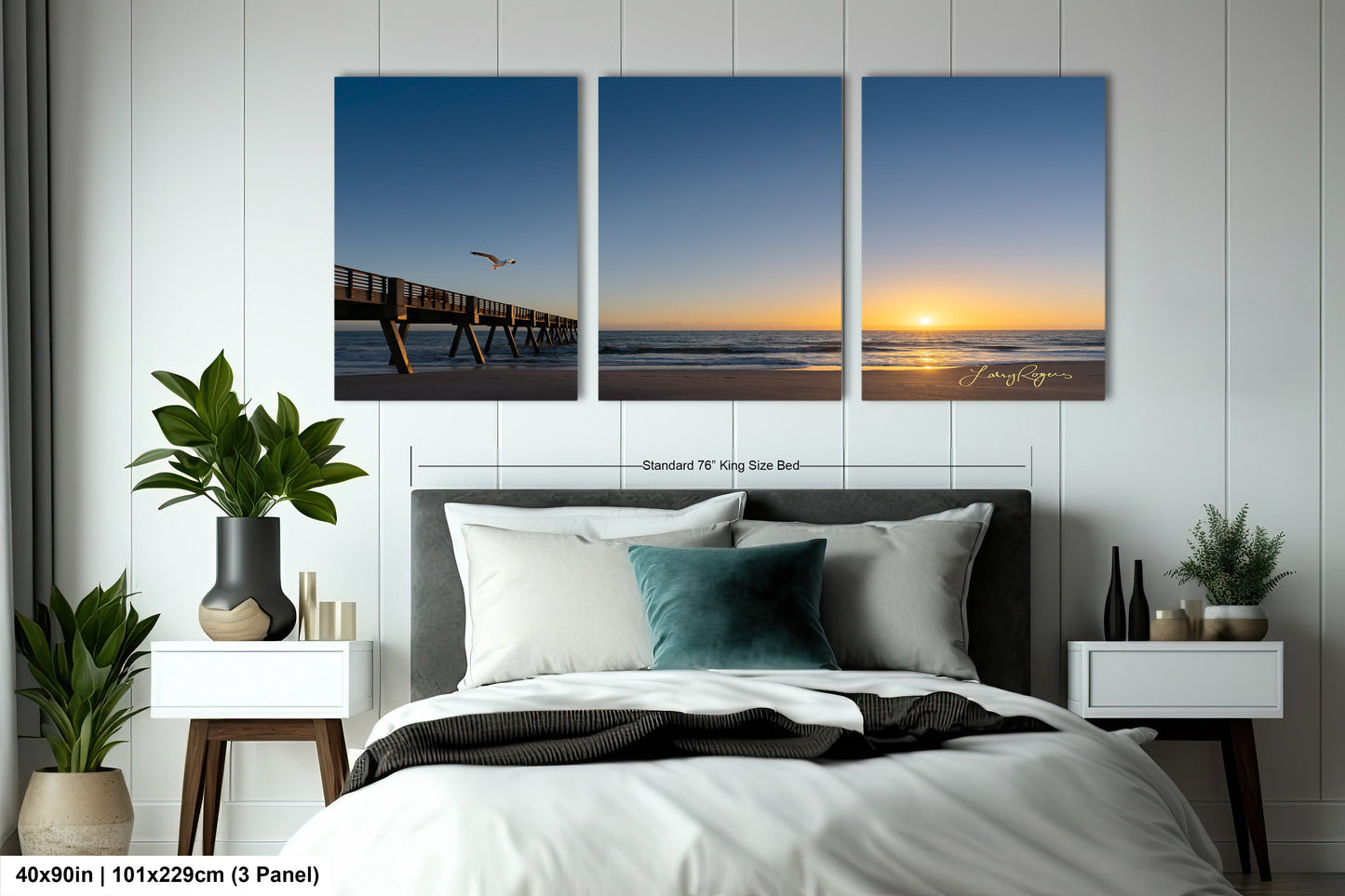 a bedroom with a bed and three pictures on the wall