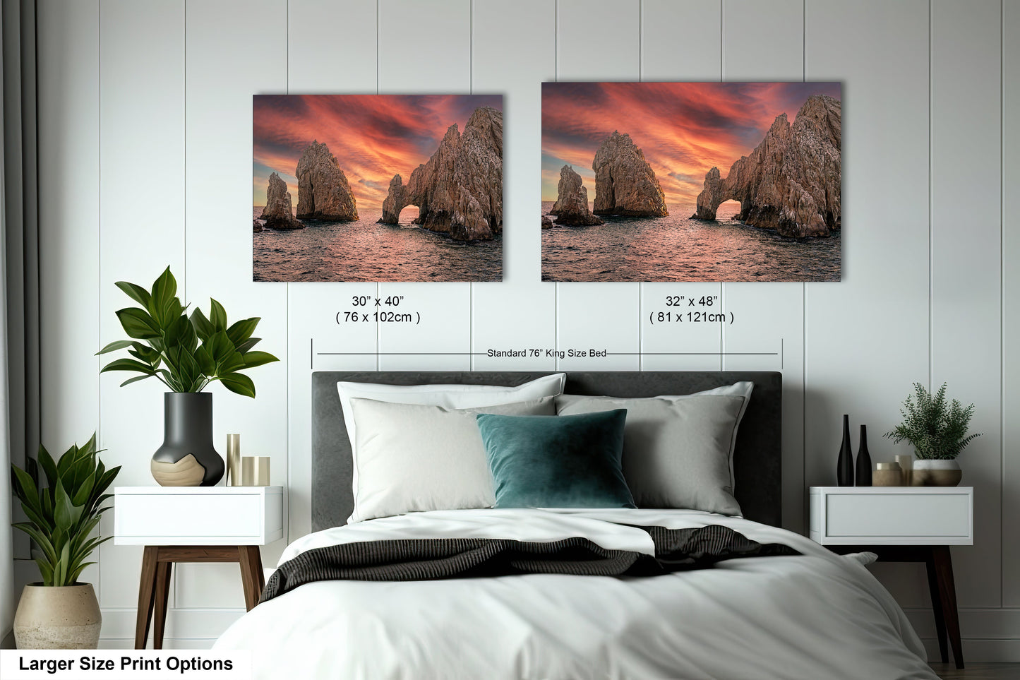 a bedroom with a bed and two pictures on the wall