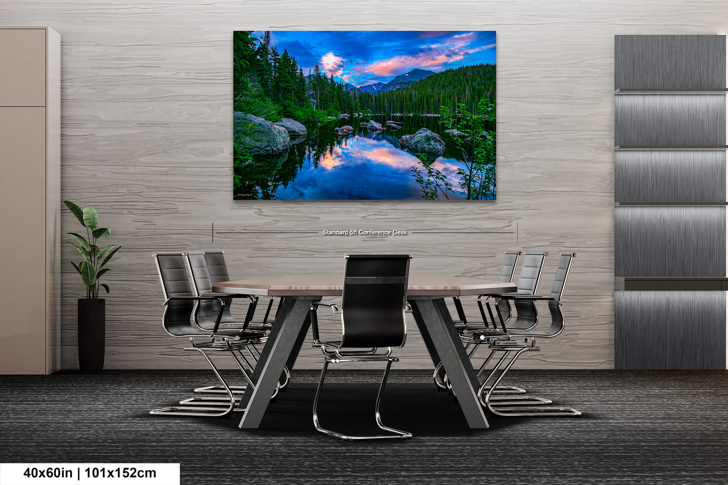 a dining room with a table and chairs and a painting on the wall