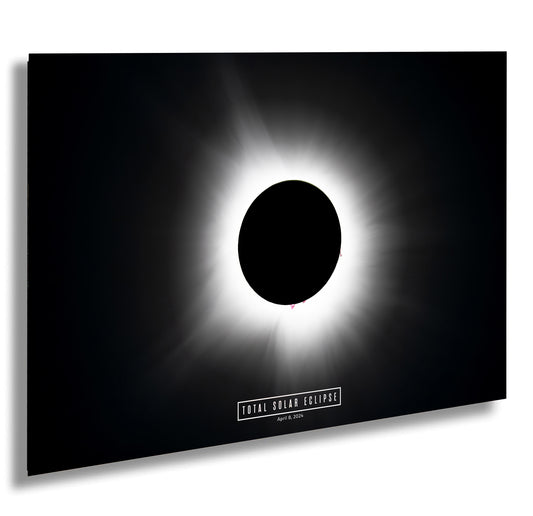 a black and white photo of a solar eclipse