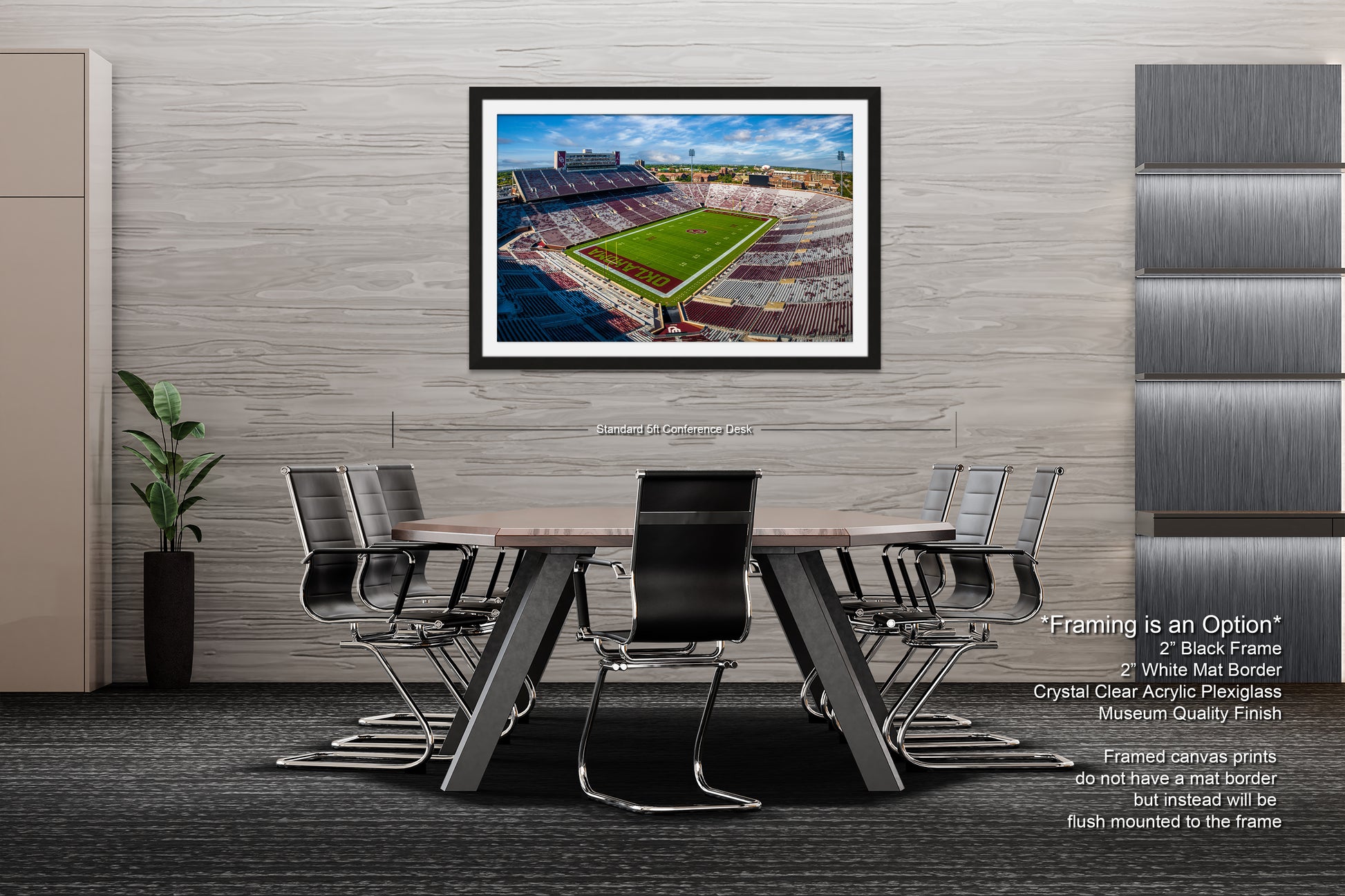 a table with chairs and a picture hanging on the wall