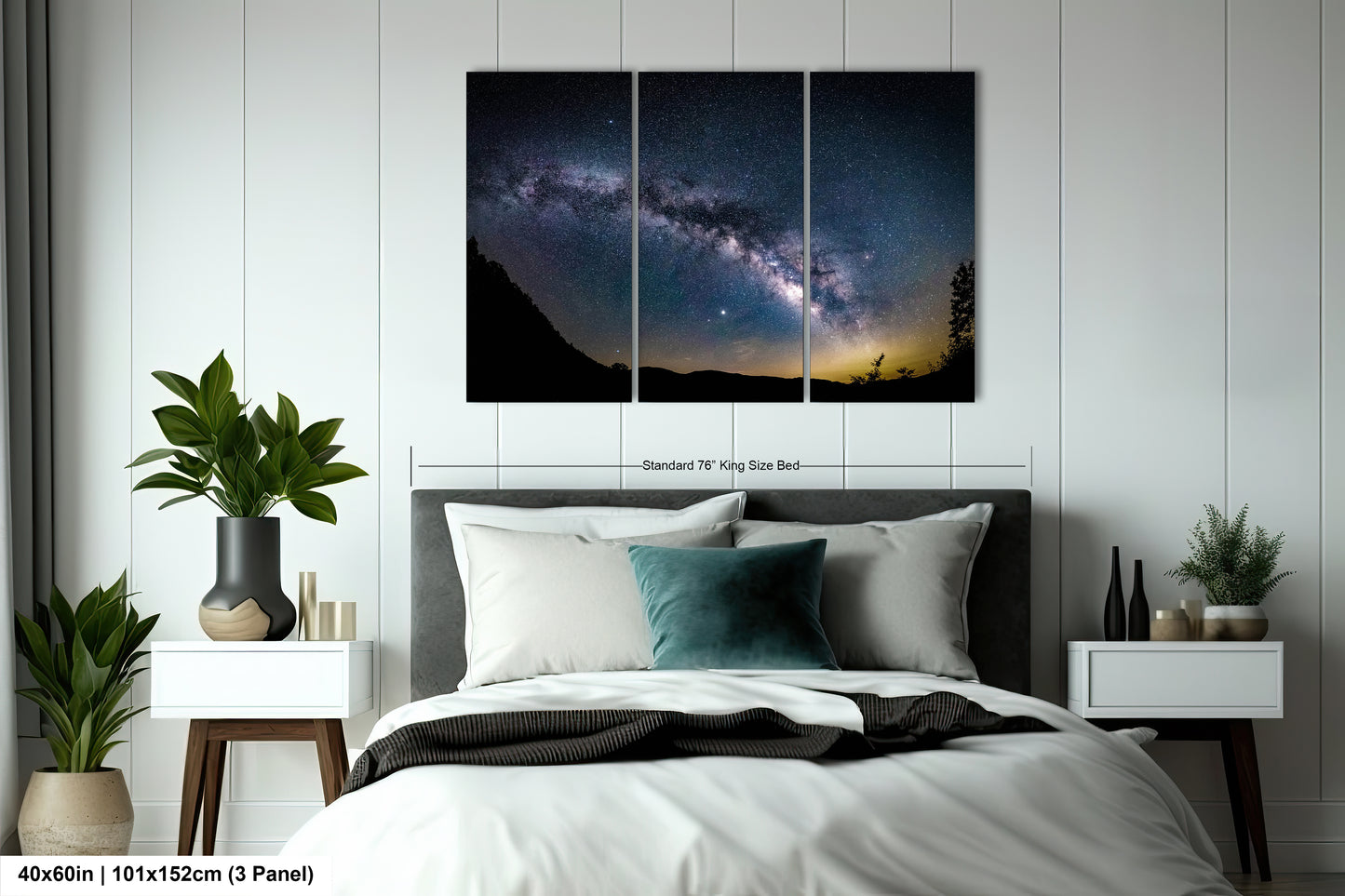 a bed room with a neatly made bed and a night sky