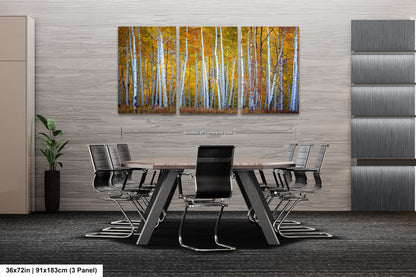 a dining room table with chairs and a painting on the wall