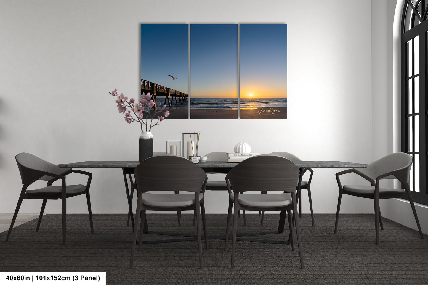 a dining room with a table and chairs
