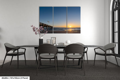 a dining room with a table and chairs