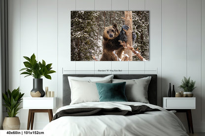 a bed room with a large bed and a picture on the wall