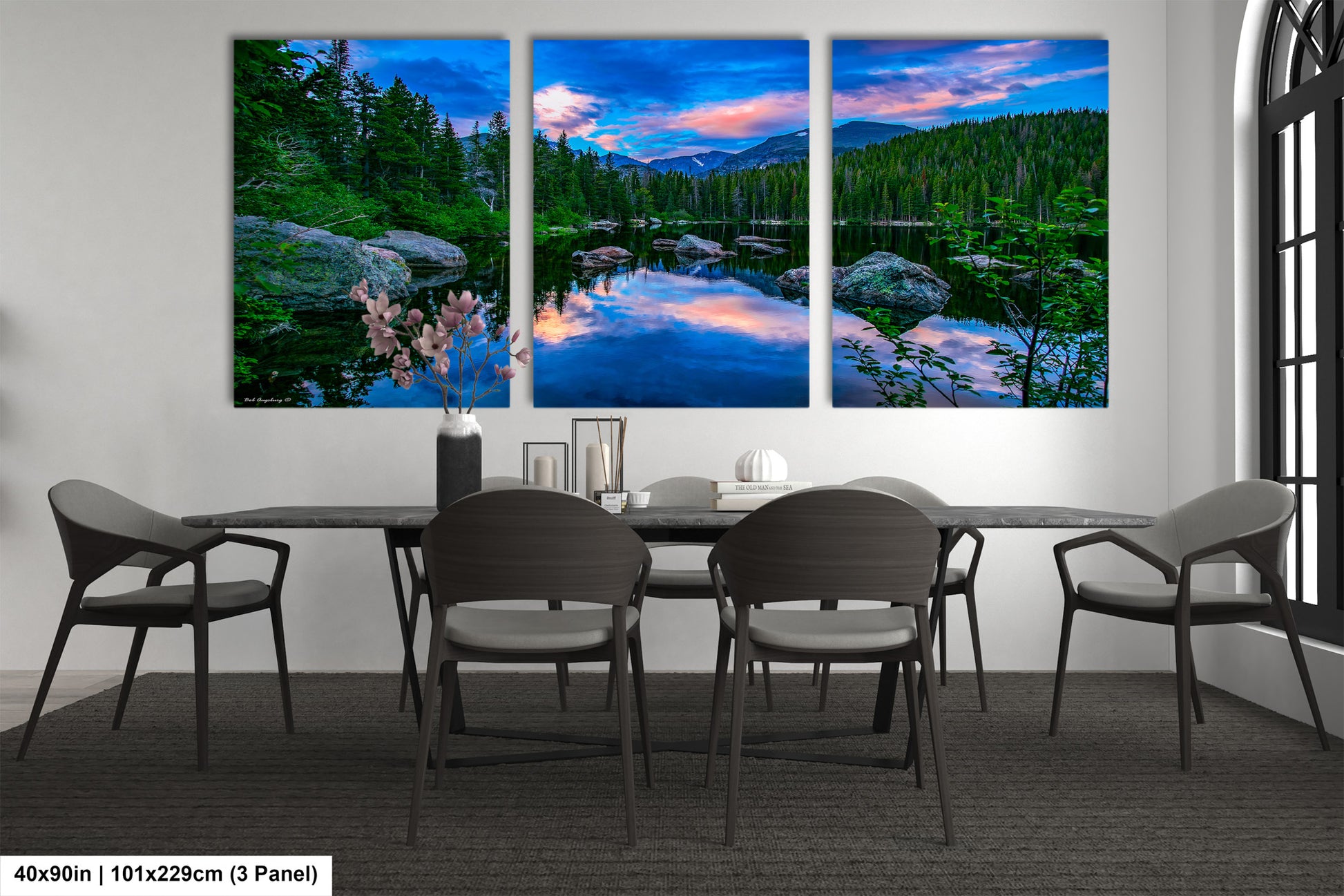 a dining room with a table and four chairs