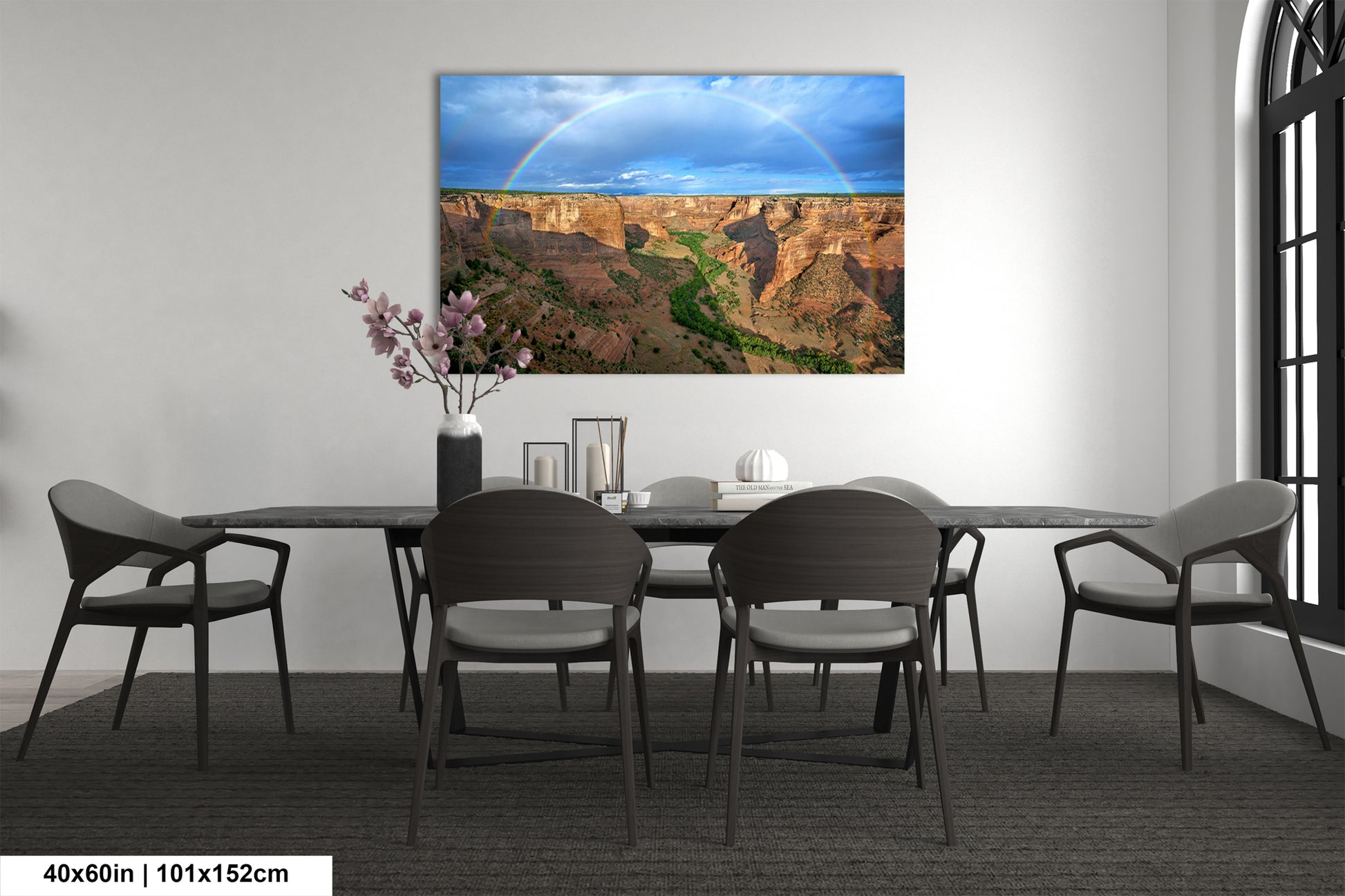 a dining room with a table and chairs and a rainbow in the sky
