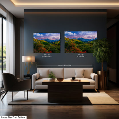a living room filled with furniture and a painting on the wall