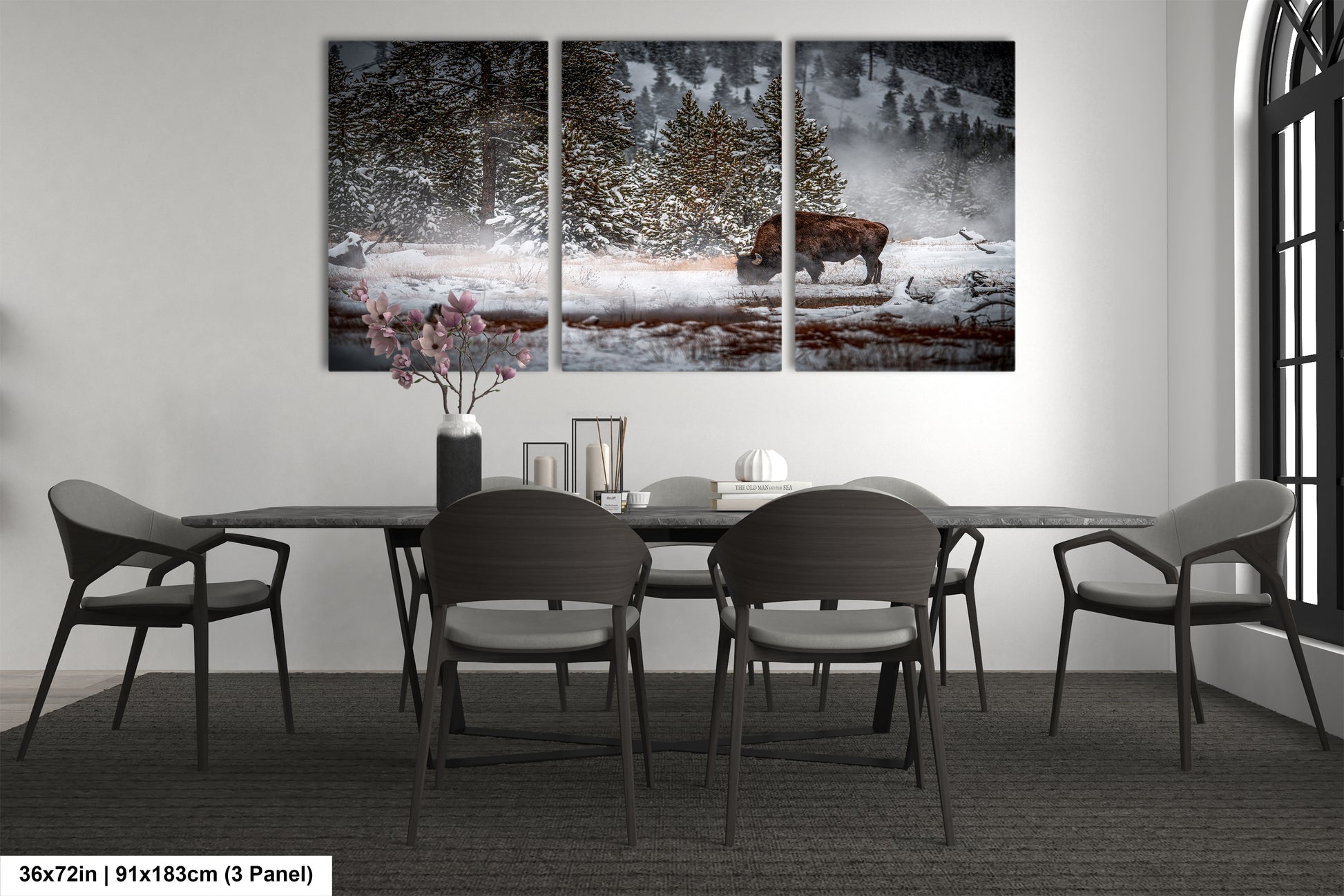 a dining room table with chairs and a painting on the wall