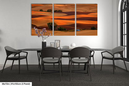 a dining room with a table and chairs