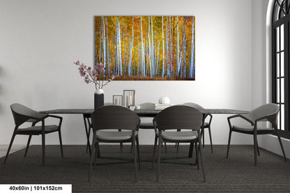 a dining room table with chairs and a painting on the wall