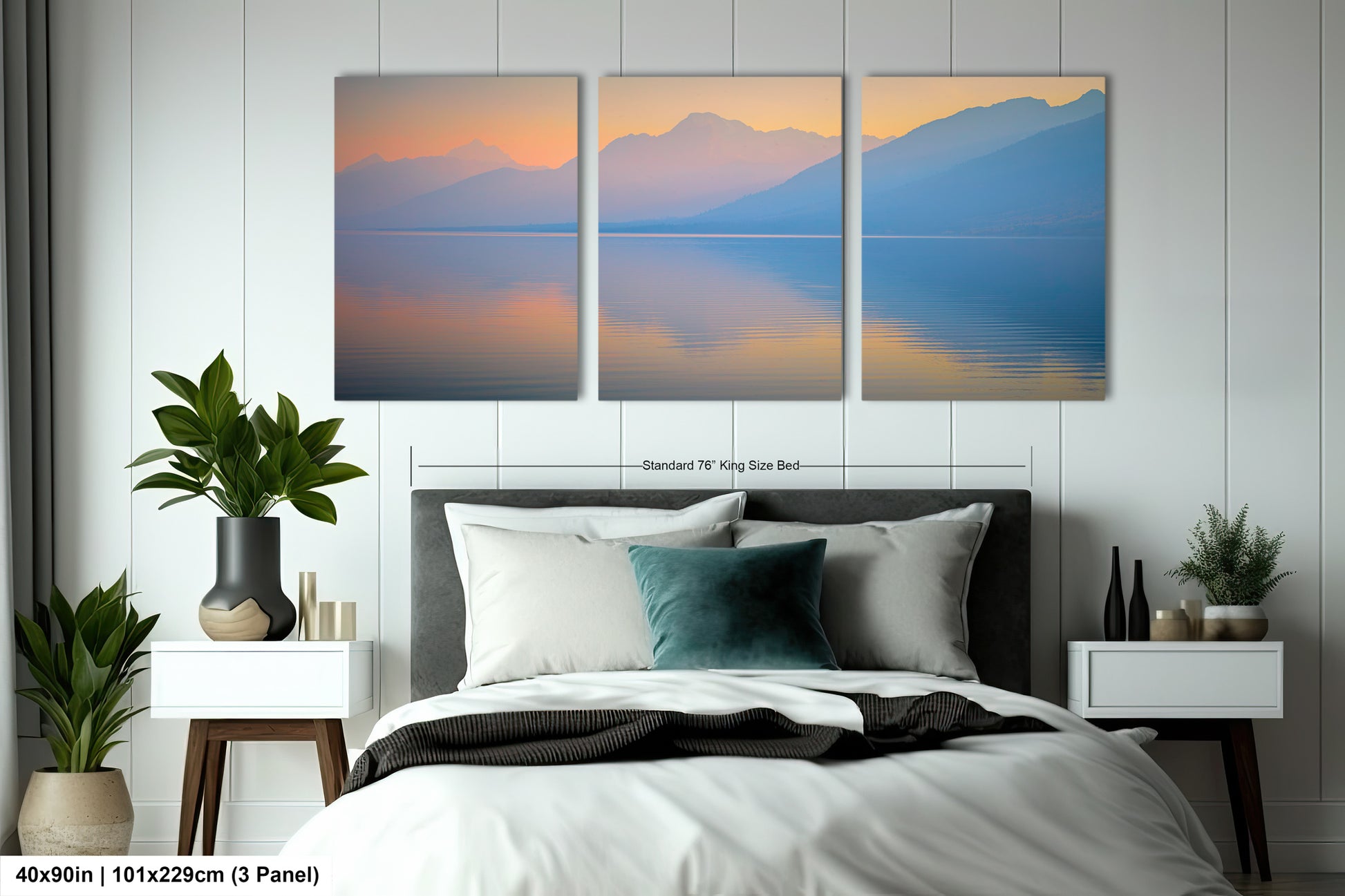 a bedroom with a large bed and three paintings on the wall