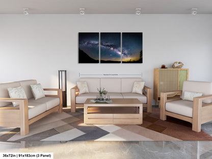 a living room filled with furniture and a painting on the wall