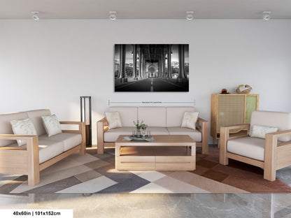 a living room filled with furniture and a painting on the wall