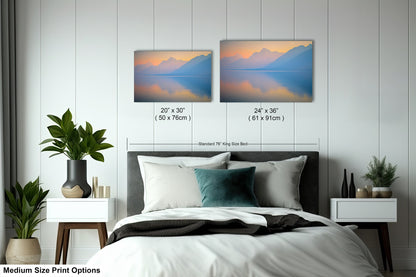 a bedroom with a bed and two pictures on the wall