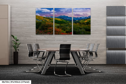 a dining room with a table and chairs