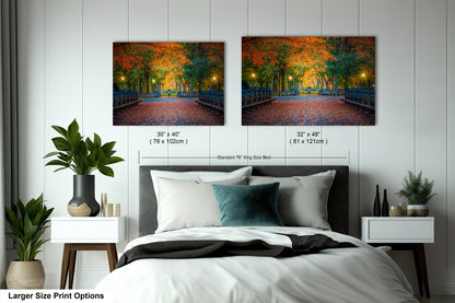 a bedroom with a bed and two pictures on the wall