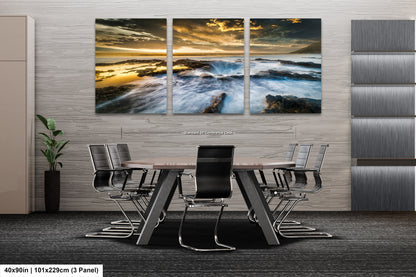 a dining room table with chairs and a painting on the wall