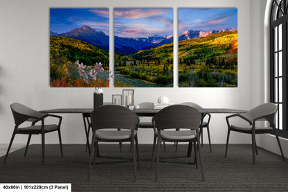 a dining room with a table and four chairs