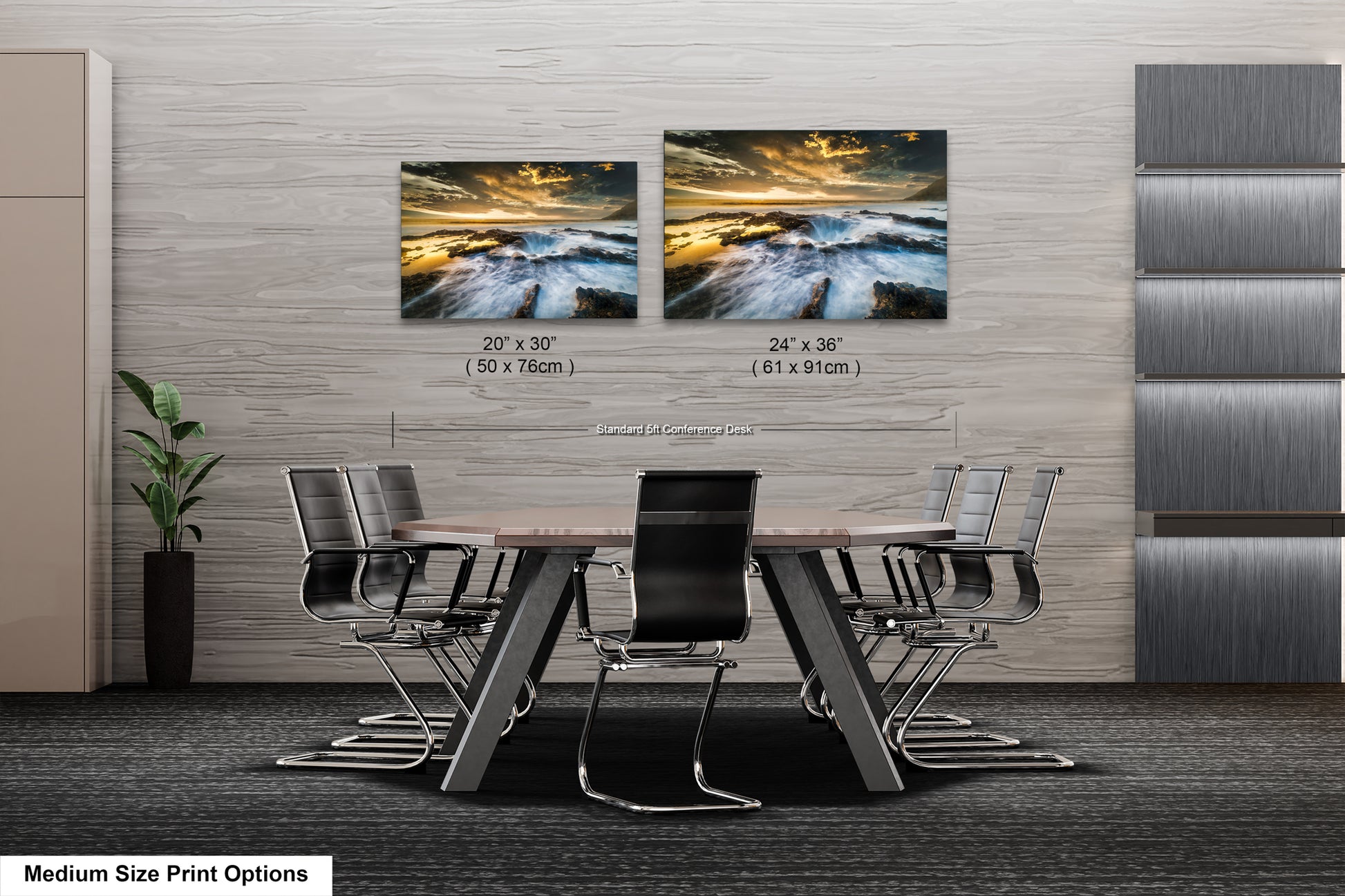 a dining room table with four chairs and two pictures on the wall