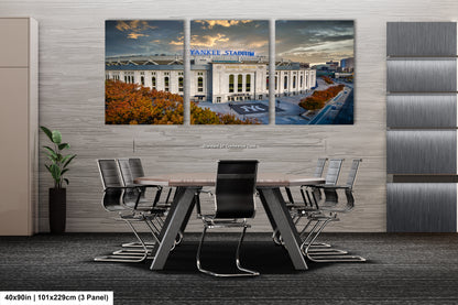 a dining room table with chairs in front of a white building