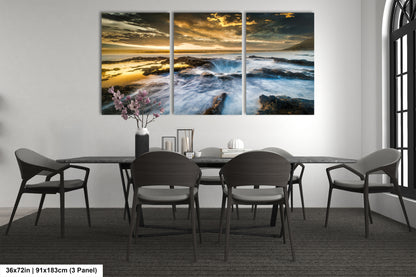 a dining room table with chairs and a painting on the wall