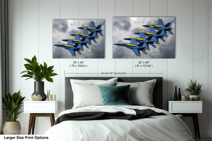 two blue and yellow planes flying in the sky above a bed