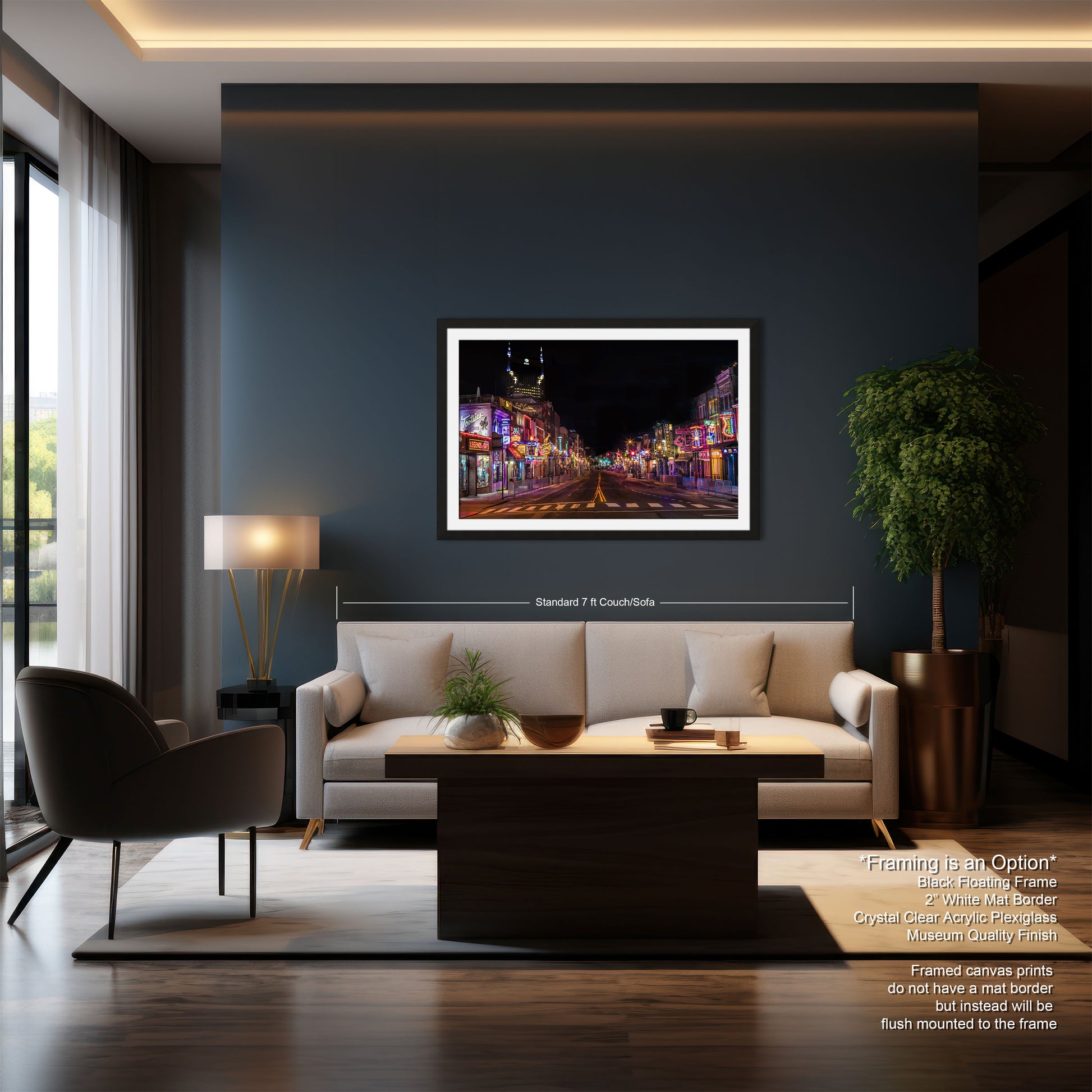 a living room with a couch a chair and a painting on the wall