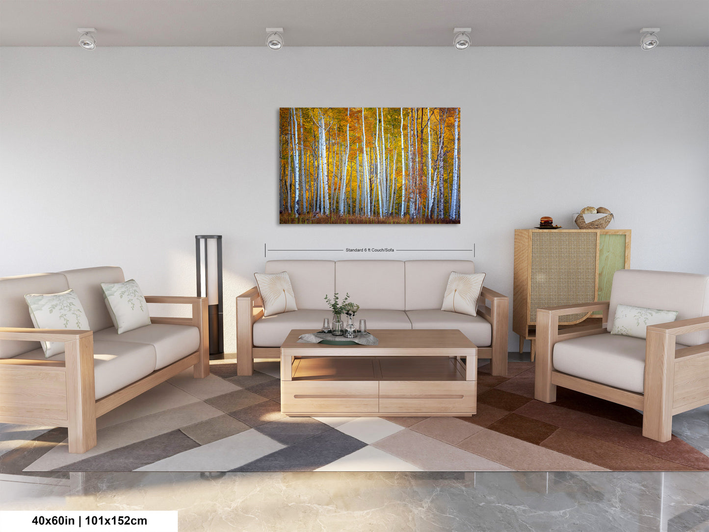 a living room filled with furniture and a painting on the wall