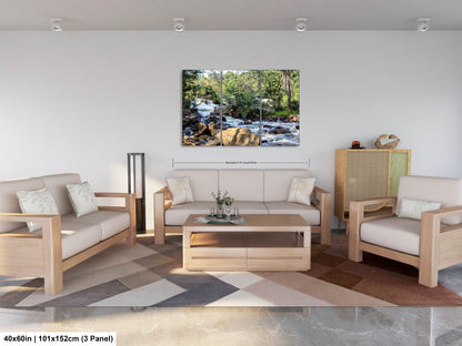 a living room filled with furniture and a painting on the wall