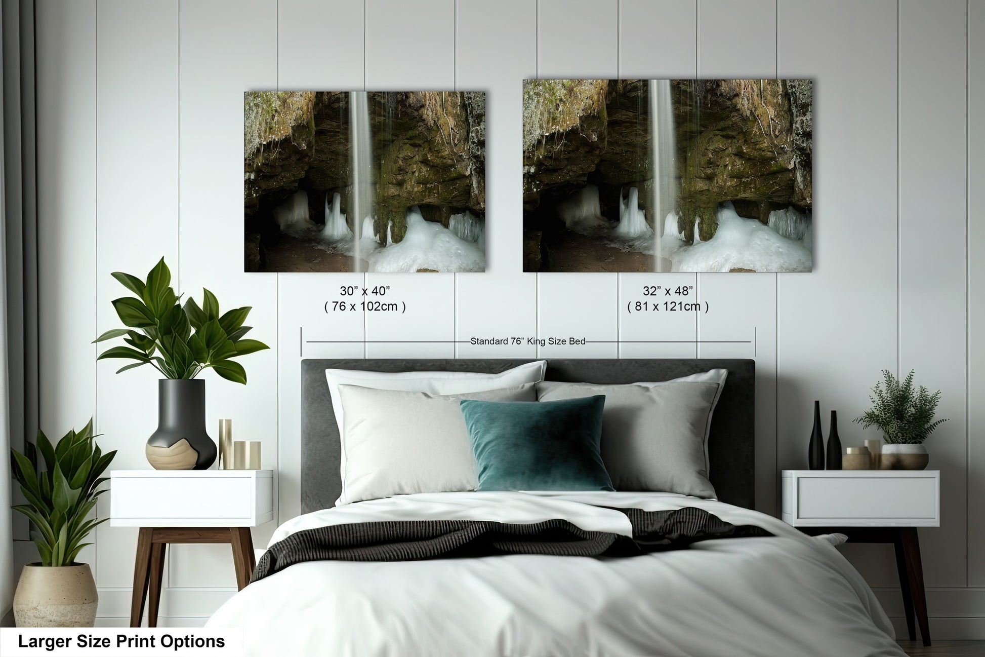 a bed room with a neatly made bed and two pictures on the wall